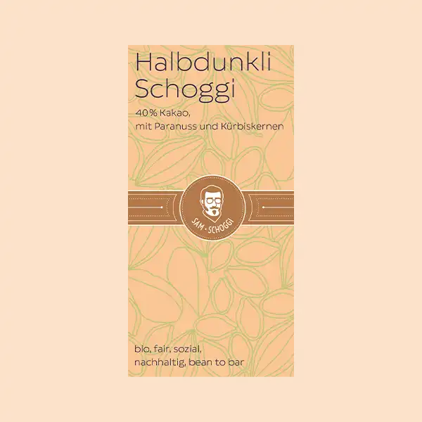 beige Verpackung Halbdunkli Schoggi Paranuss und Kürbiskerne